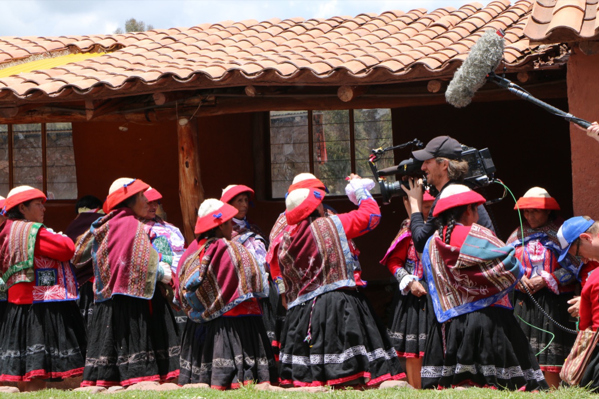 Documentary crew filming with a community in the Andes