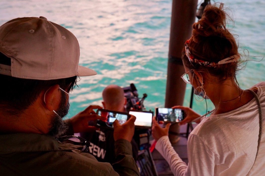 Romero & Braas crew checking wireless video feeds on an oceanfront production